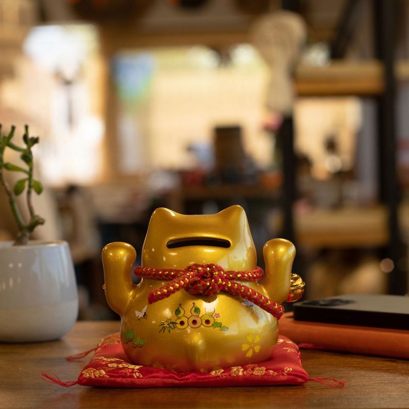 Ceramic Money Cat Bank - Gold on Cushion