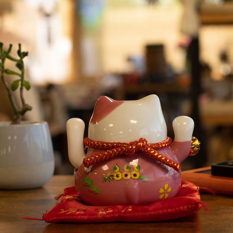 Ceramic Money Cat Moving Hand - Pink on Cushion (battery not included)