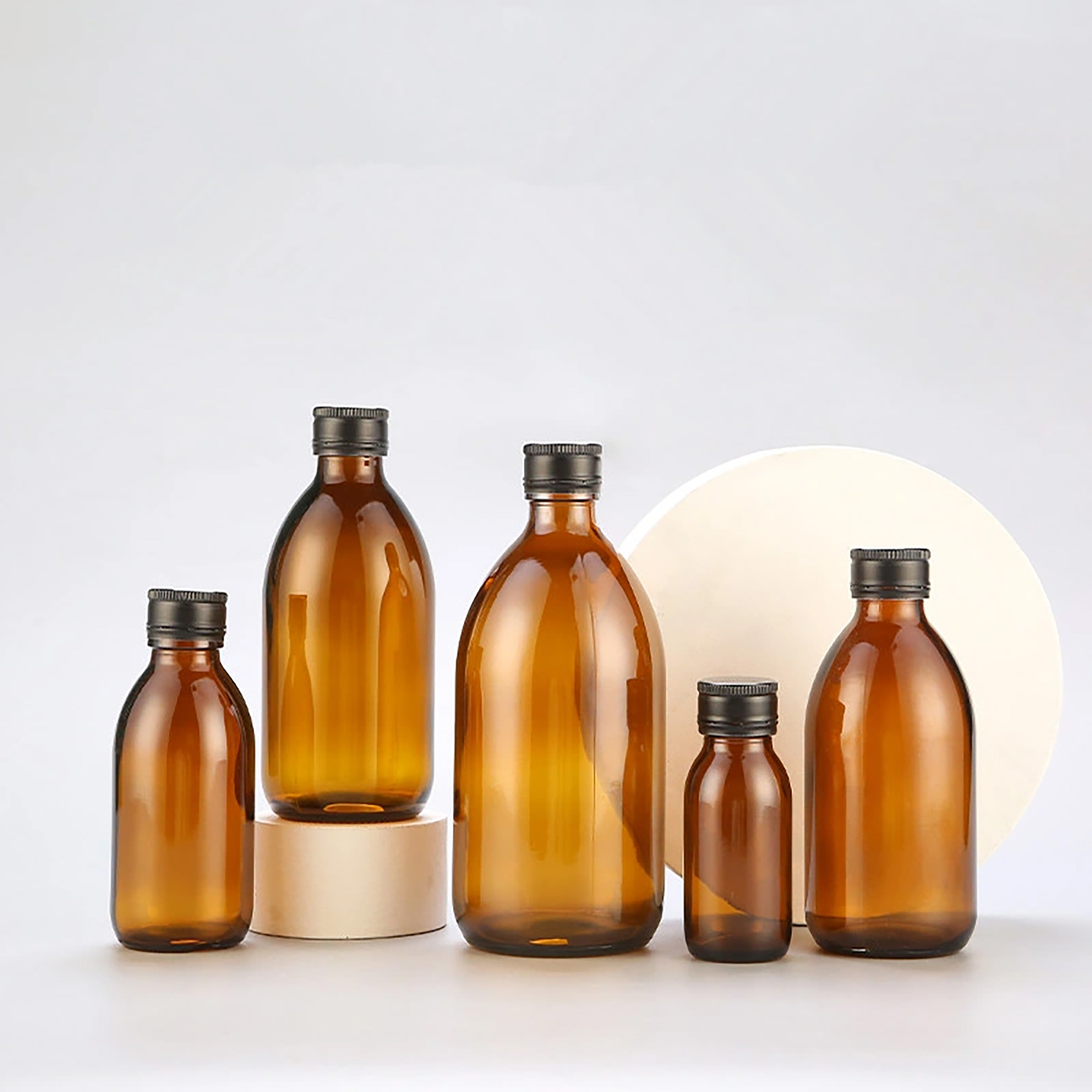 Wholesale Amber, Frosted Grey & Smoked Grey Glass Medicine Bottles – Built for White Label Brilliance
